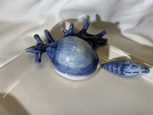 Assiette à serviette moyenne corail bleu