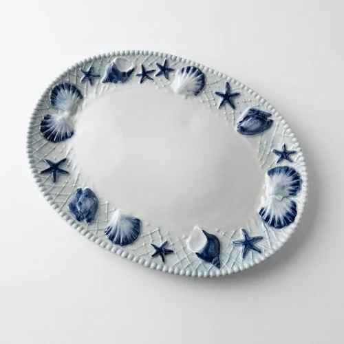 Grand plat bleu coquillages