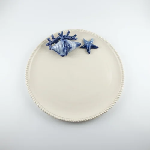 Assiette ronde corail bleu