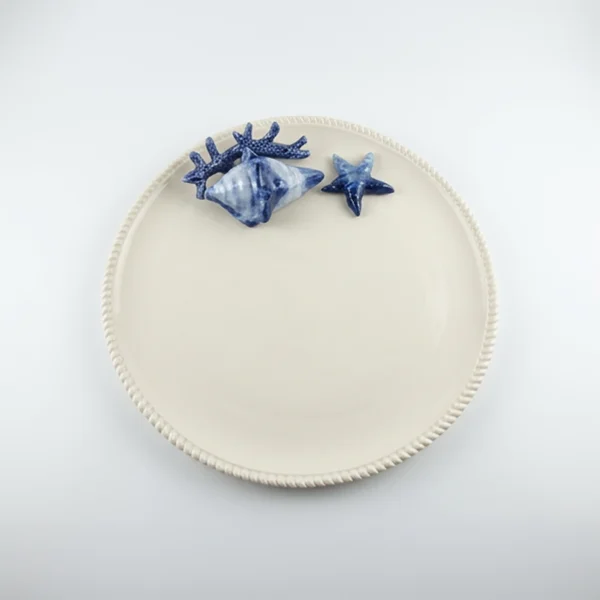 Assiette ronde corail bleu