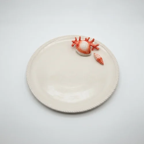 Assiette ronde corail rouge