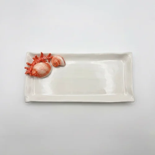 Assiette à serviette corail rouge