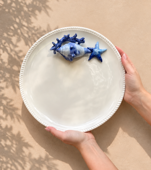 Assiette ronde corail bleu