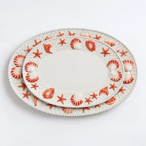 Petit plat rouge coquillages