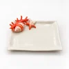 Petite assiette à serviette corail rouge