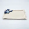 Assiette à serviette moyenne corail bleu