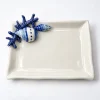 Petite assiette à serviette corail bleu