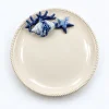Assiette ronde corail bleu
