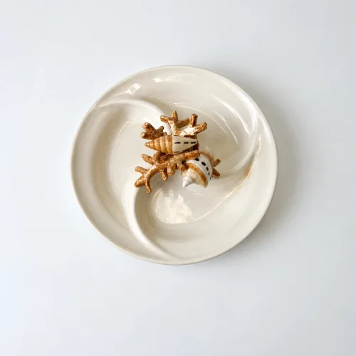 Assiette à tapas corail beige