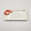 Assiette à serviette corail rouge