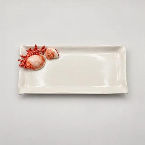 Assiette à serviette corail rouge