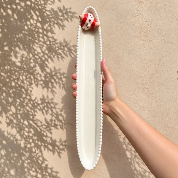 Plat à baguette rouge